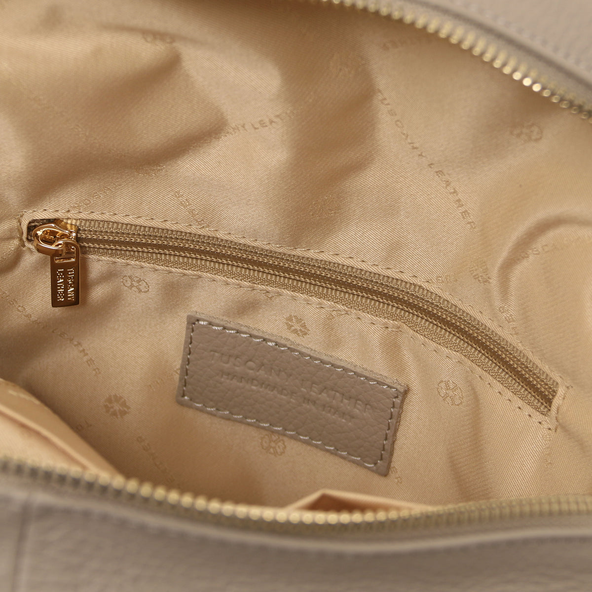 Sac à dos femme ELARA compact en cuir grainé à poche zippée